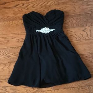 B. Smart black cocktail dress